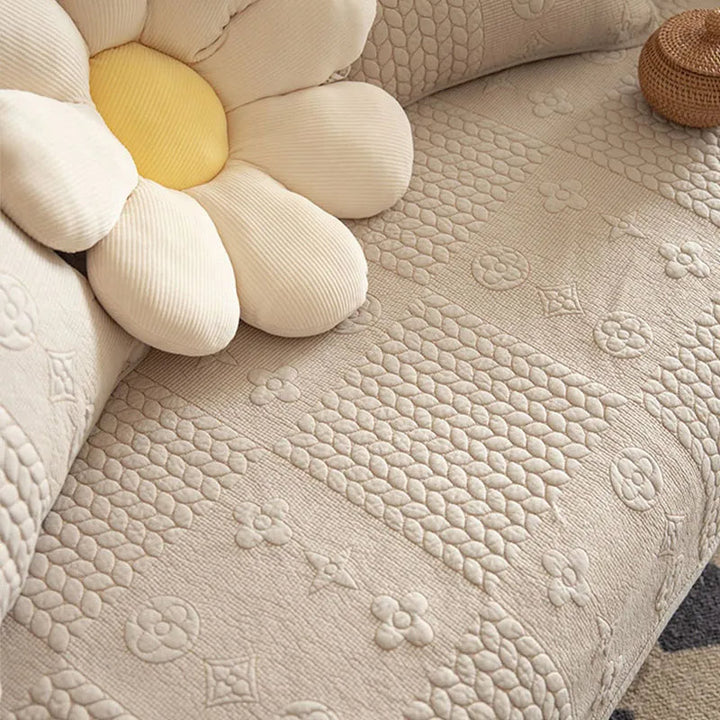 Pet-friendly sofa protector in cotton, anti-slip backing and unique 3D wheat embroidered pattern