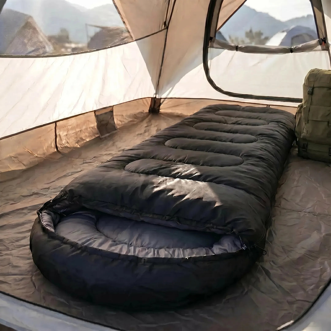 Portable 4-Season Sleeping Bag for camping. Versatile mummy-style provides warmth & comfort in cold weather.