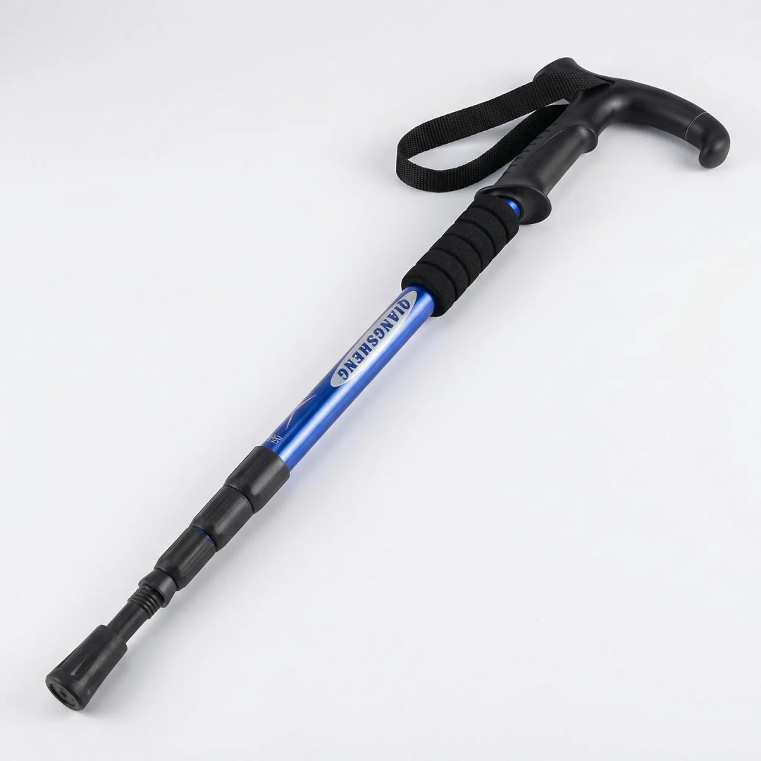 Adjustable 4-section trekking pole, folded for storage. Compact walking stick, essential outdoor gear.