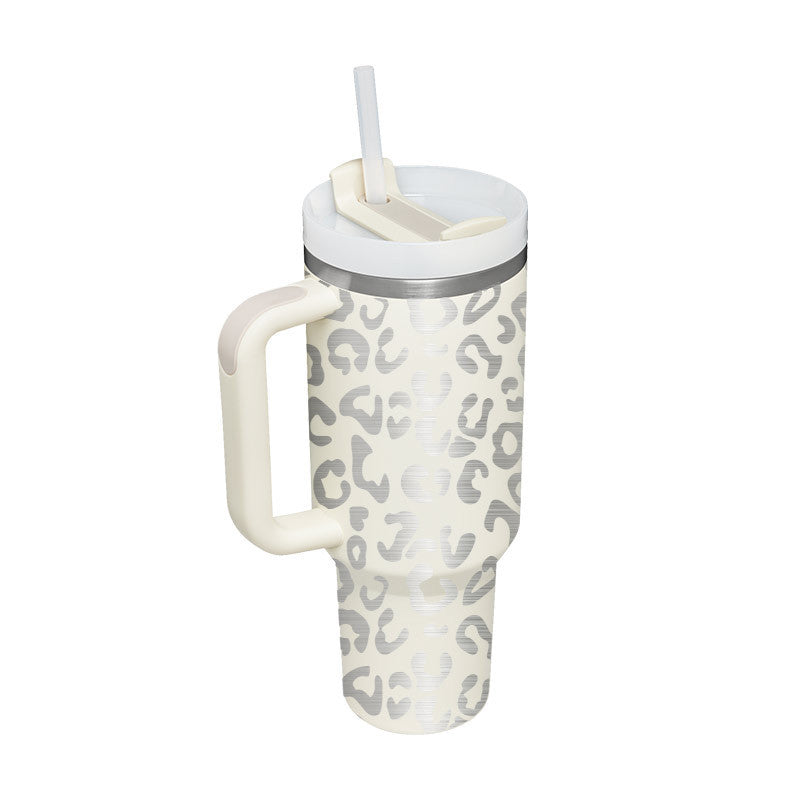 Unisex 40 fl oz insulated travel mug. With handle & straw. Enjoy your hot coffee or cold water anywhere.