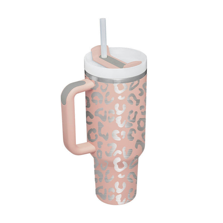Hot/cold 40oz insulated tumbler with handle. Unisex, includes a reusable straw for convenience.