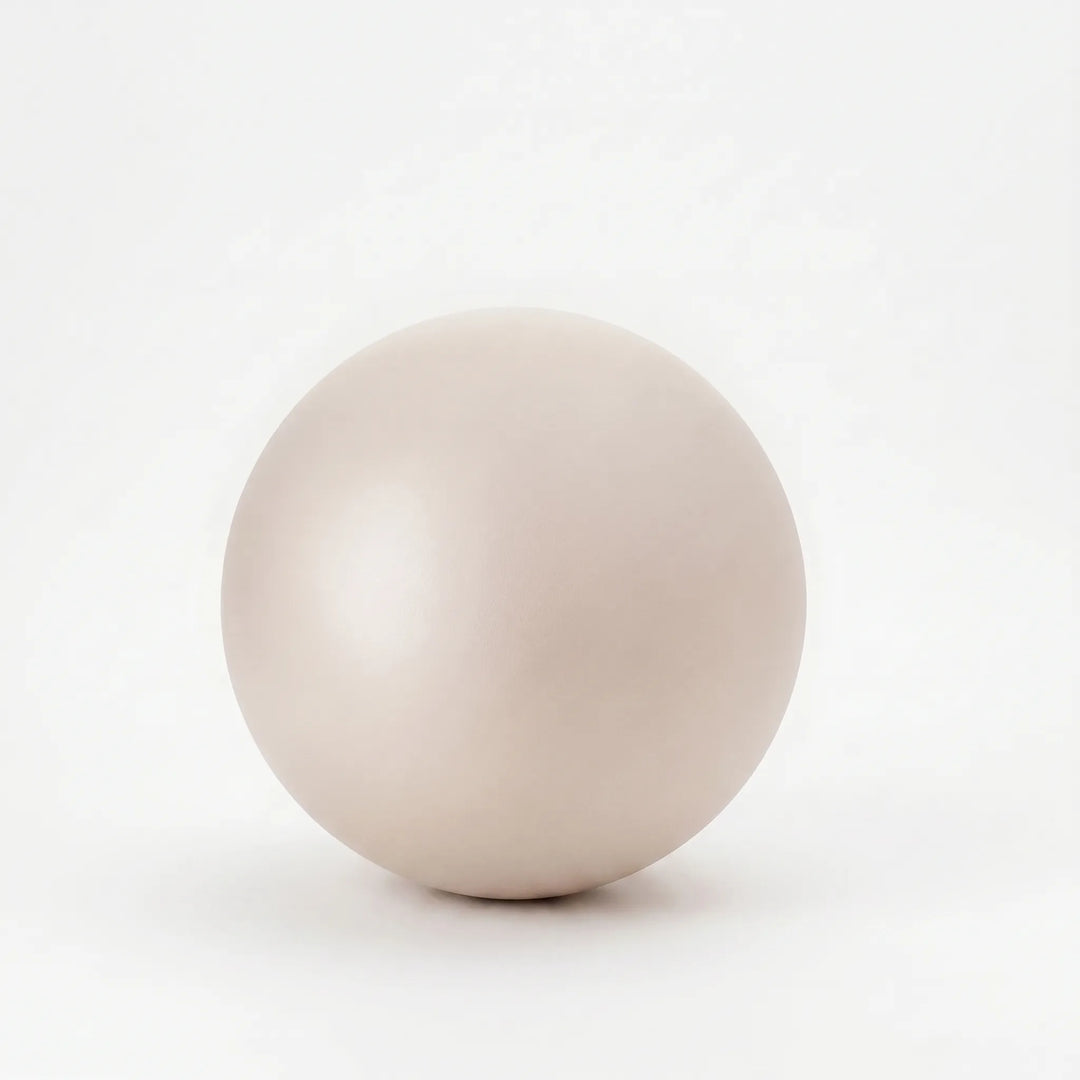 Versatile unisex 9-inch yoga mini ball, perfect for enhancing core stability and flexibility.