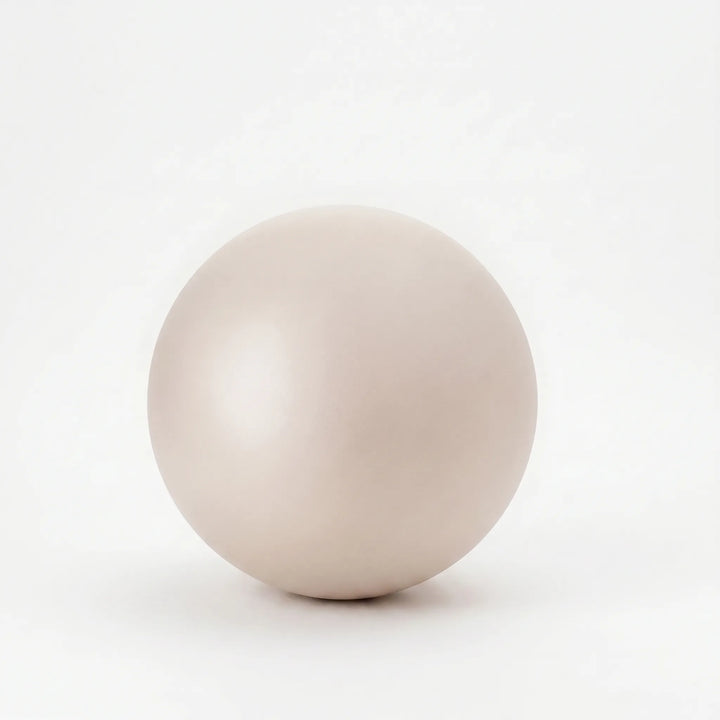 Versatile unisex 9-inch yoga mini ball, perfect for enhancing core stability and flexibility.