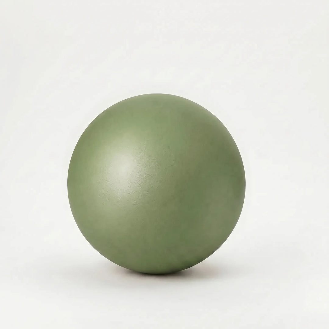 Portable 9-inch PVC mini fitness ball for yoga, Pilates, and core strength home workouts.