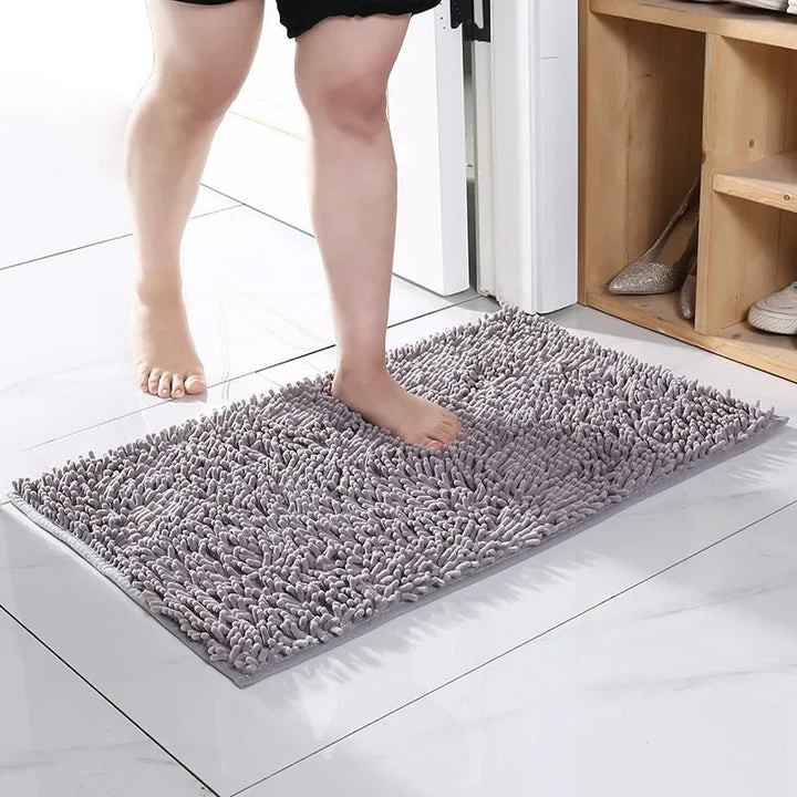 Close-up of a chenille microfiber dog doormat, showing its absorbent texture for pet paws