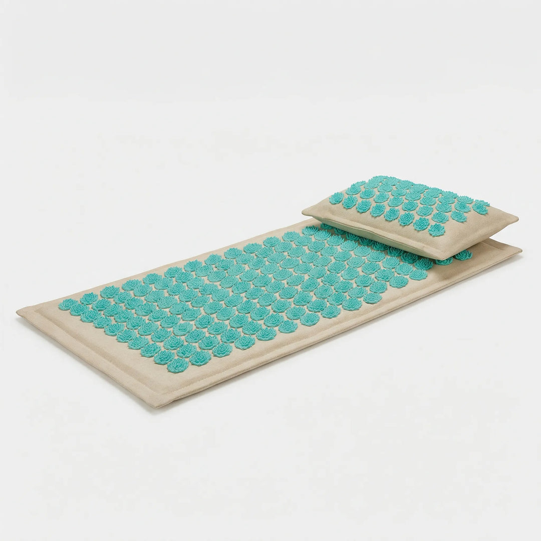 Calming acupressure massage mat & pillow for home therapy. Spiked design targets pressure points for wellness.
