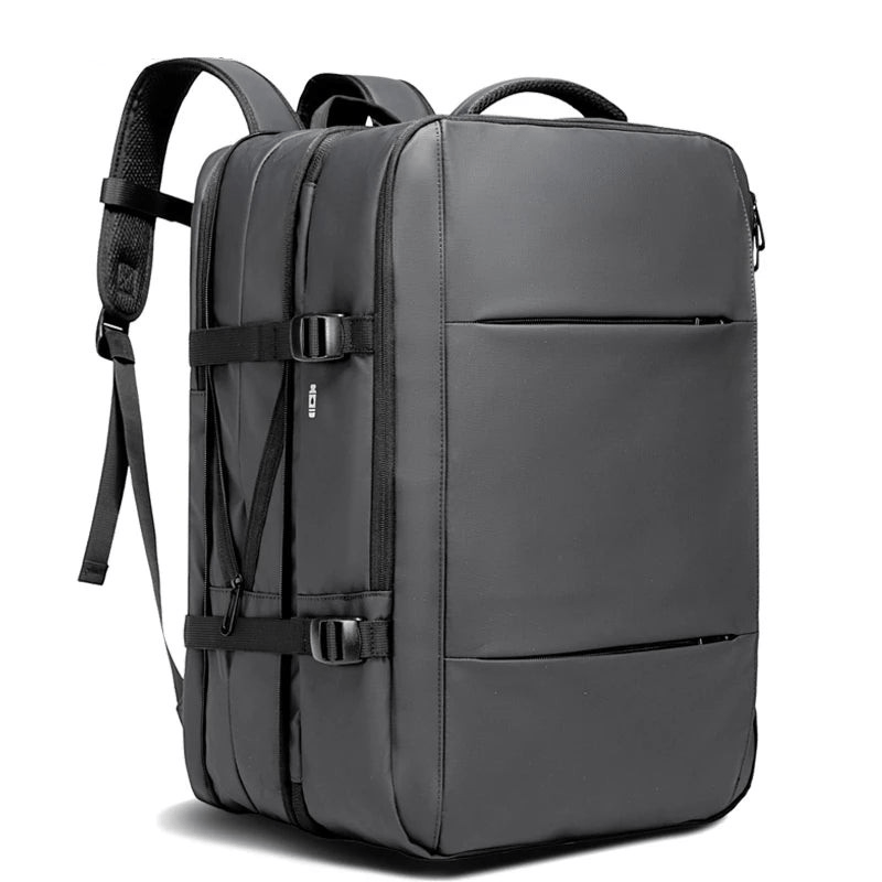 Expandable business laptop backpack with USB charging port, designed for 17-inch laptops and work.