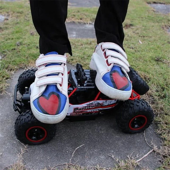 The rugged design of the Unisex All-Terrain Remote Control Monster Truck, showcasing durability.