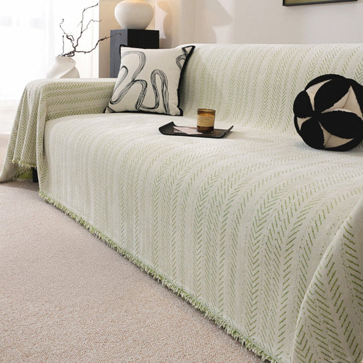 Soft chenille couch cover in a neutral tone, ideal for homes with pets, washable and scratch resistant
