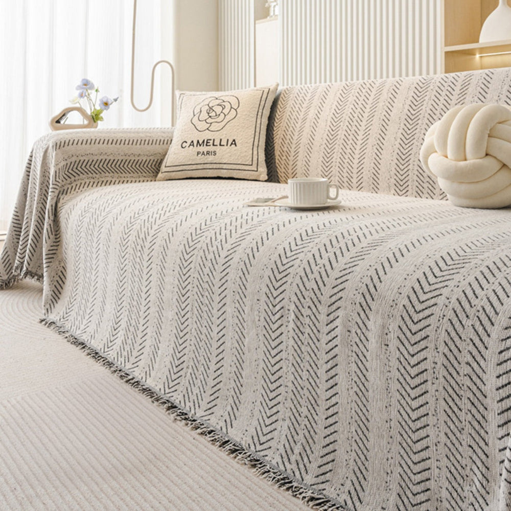 Living room scene with a unisex anti-scratch chenille couch cover, enhancing home decor