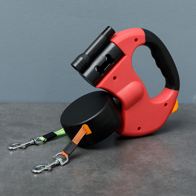 Ergonomic handle of a double dog leash, featuring an LED light and comfortable grip.