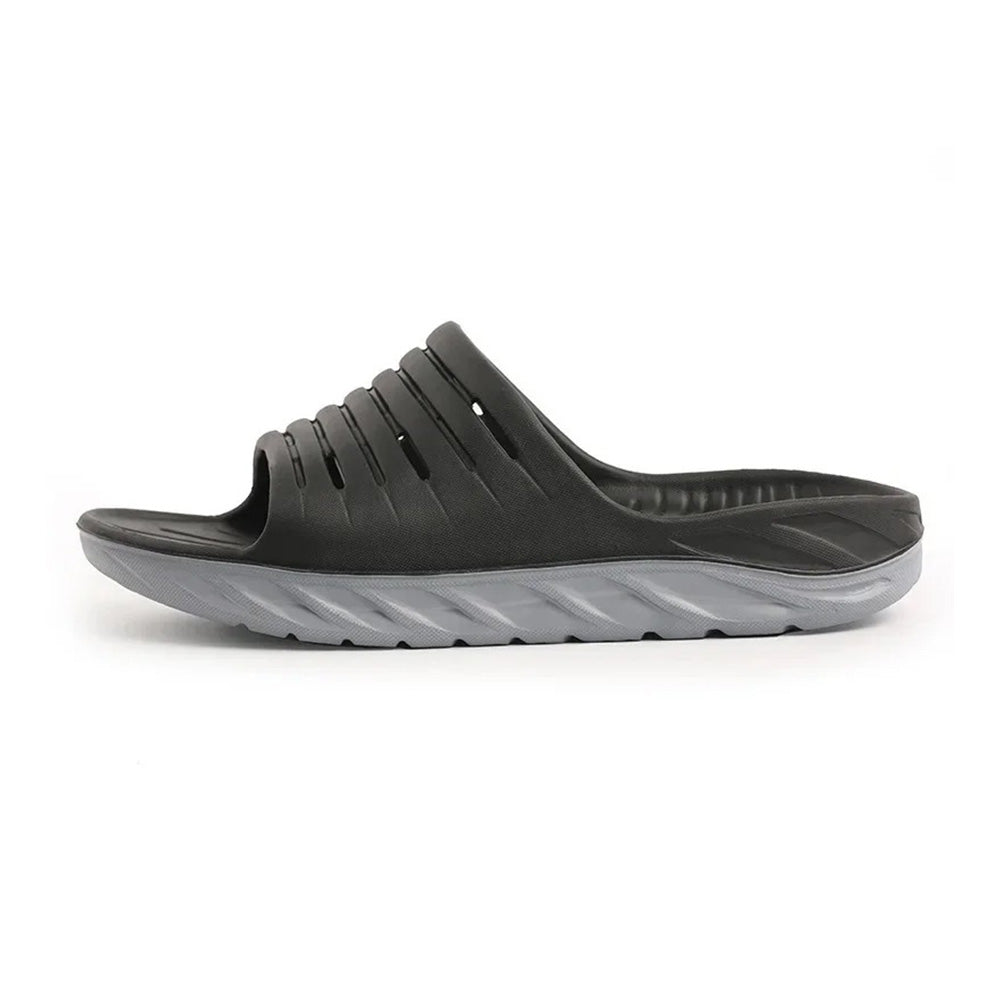 Unisex arch support slides in black, offering heel & arch relief. Ideal comfort footwear for daily pain relief.