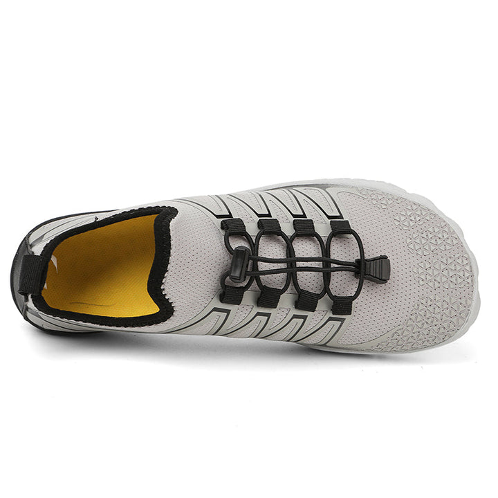 Lightweight unisex running shoes, promoting a natural stride. Breathable & comfortable for outdoor use.