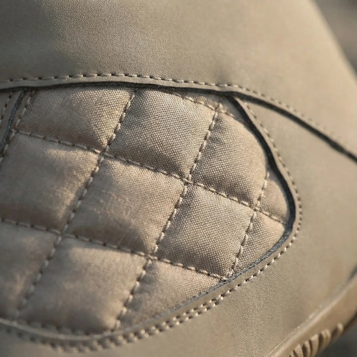 Water repellent winter ankle boots for men & women, ideal for cold weather, minimalist barefoot design.