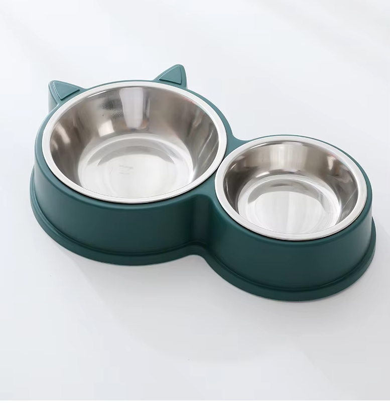 Modern pet feeder with two stainless steel bowls, a black cat ear base for stability