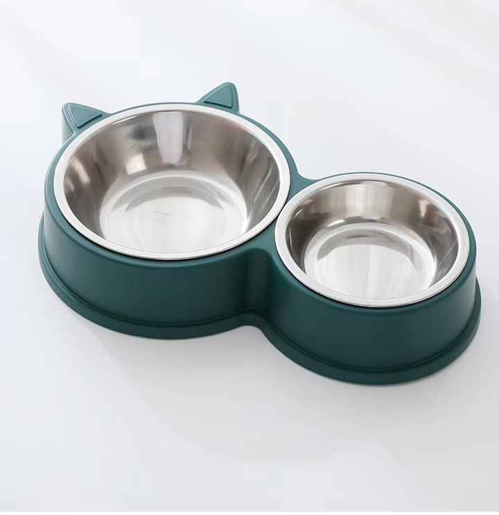 Modern pet feeder with two stainless steel bowls, a black cat ear base for stability