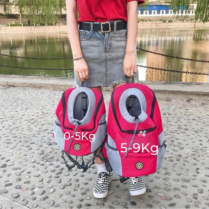 Unisex black pet travel carrier backpack, perfect for small to medium dogs on outdoor adventures.
