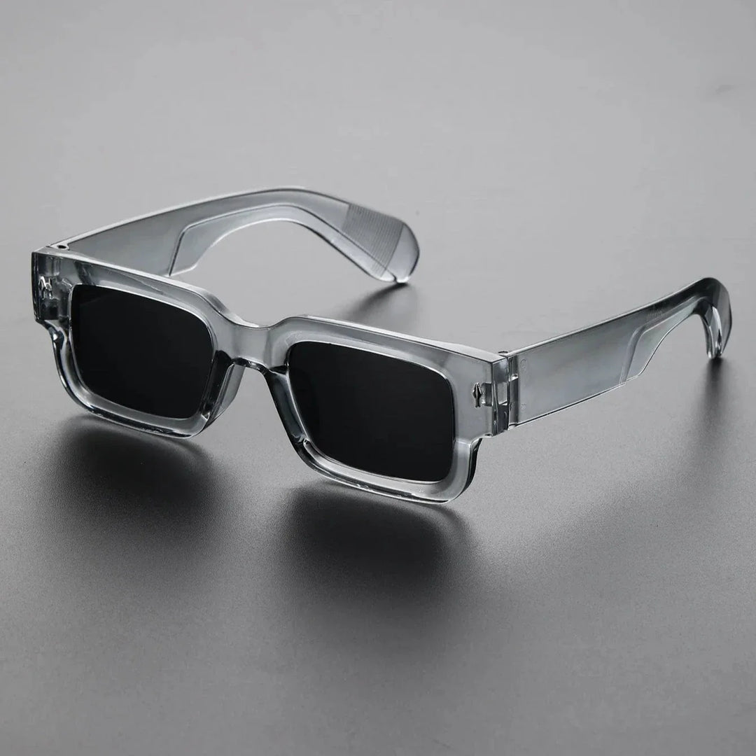 Unisex bold rectangular sunglasses, a stylish fashion accessory offering UV protection for eyes.