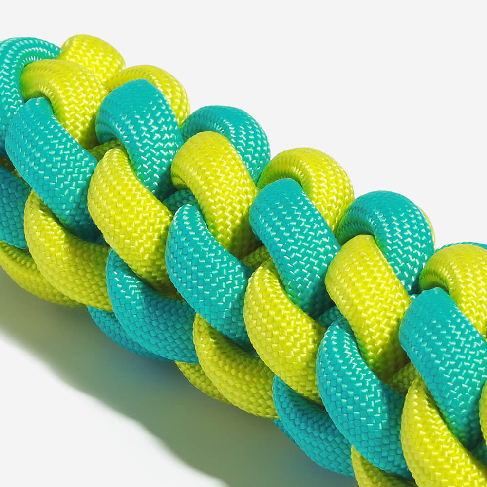 Braided rope stick dog toy in multiple colors, ideal chew and tug for pet enrichment and fun.