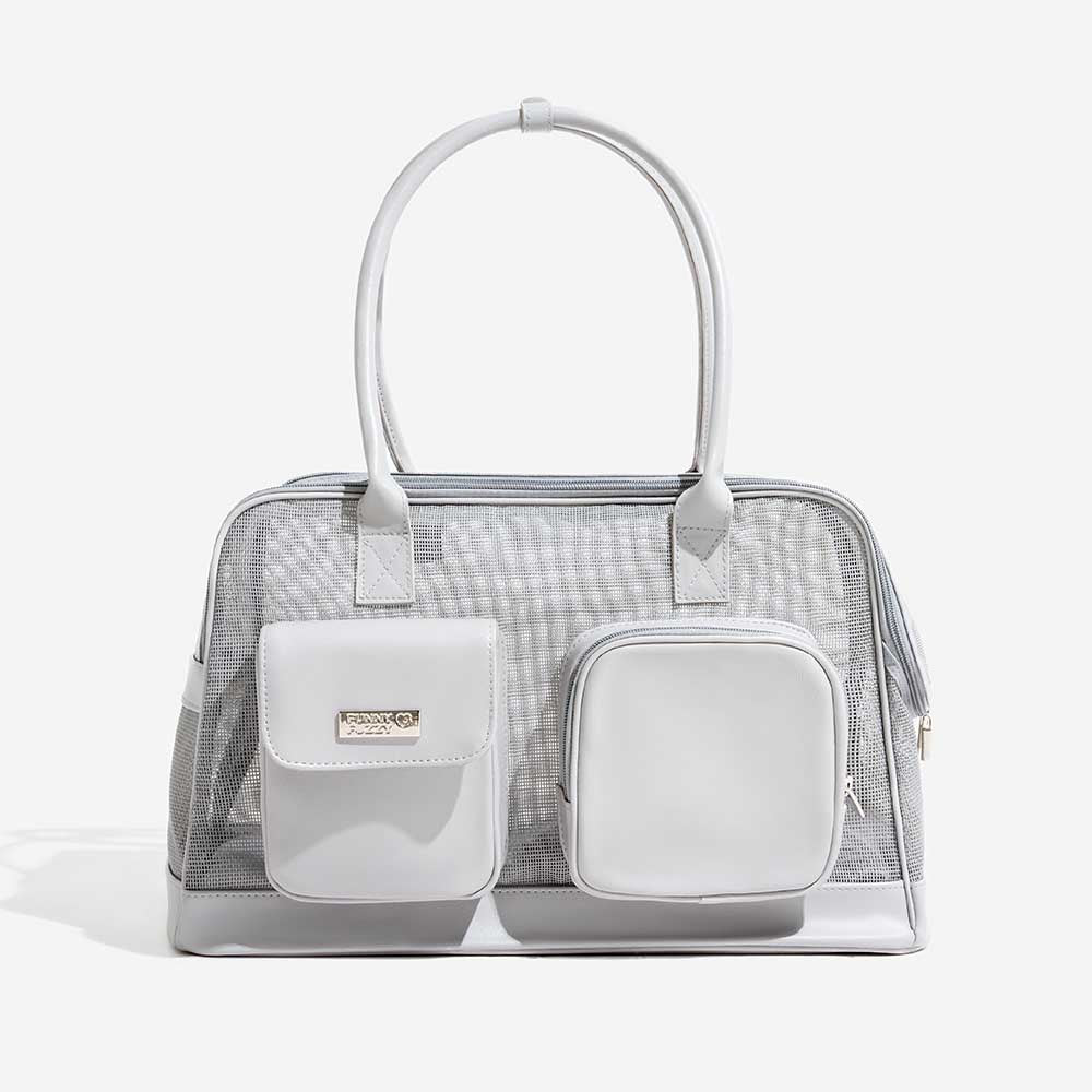 Grey breathable travel carrier with safety leash inside for secure pet transport