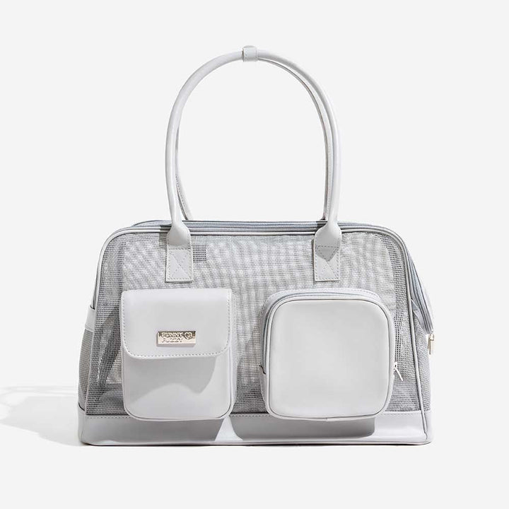 Grey breathable travel carrier with safety leash inside for secure pet transport