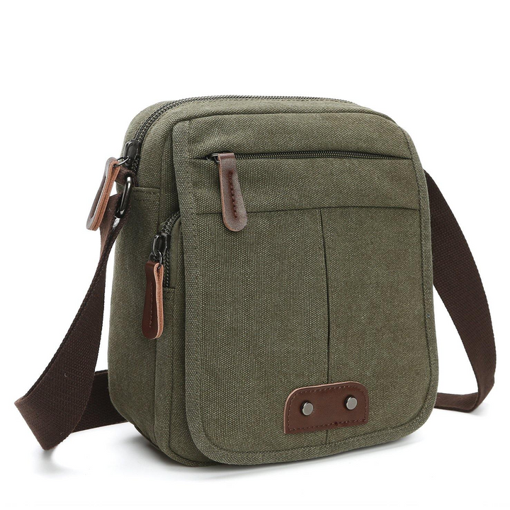 Unisex canvas crossbody bag with multiple pockets, perfect for everyday carry & organization. Durable shoulder messenger.