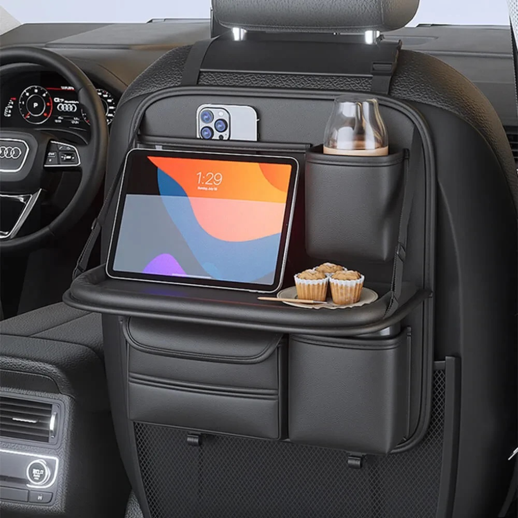 Unisex car back-seat organizer with multiple pockets & foldable tray table for auto storage.