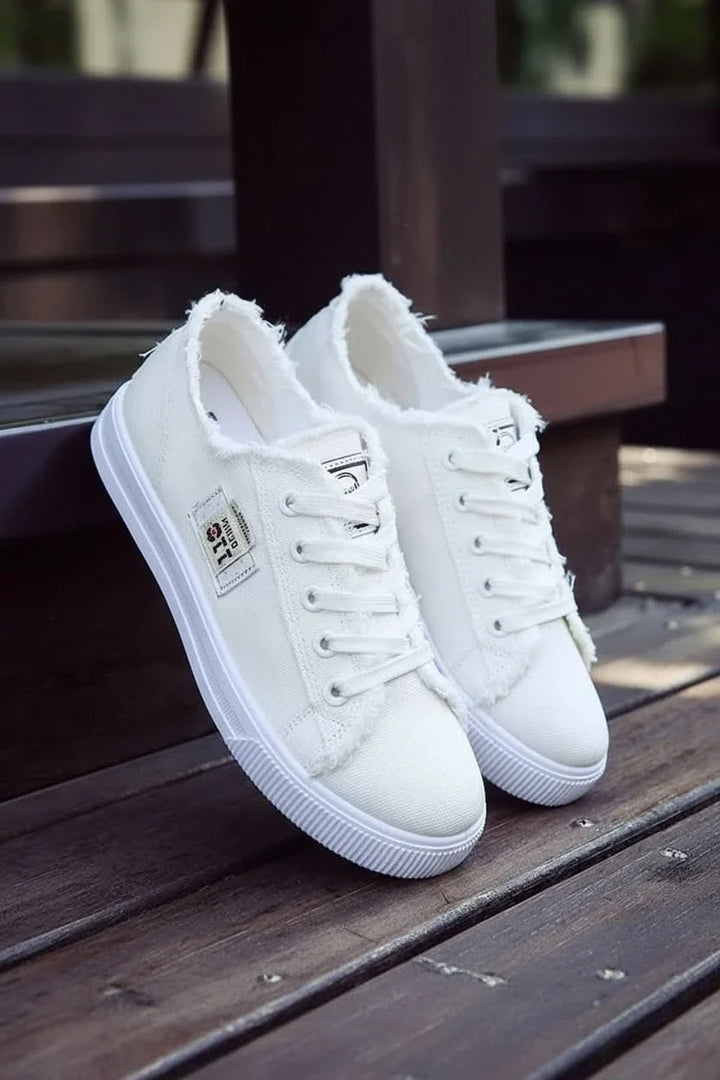 Stylish high-top lace-up sneakers, unisex design, perfect for casual everyday streetwear.