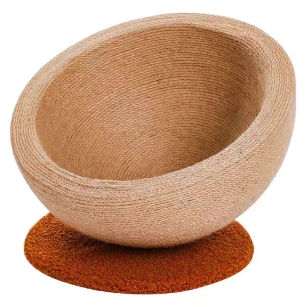 Sisal cat scratching ball doubling as a comfy cat bed, essential pet supplies for feline play.