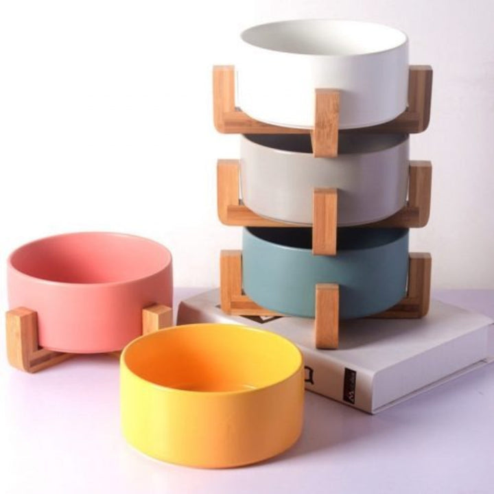 Hygienic ceramic pet bowl on a stylish wooden stand, spill-proof dog or cat feeder