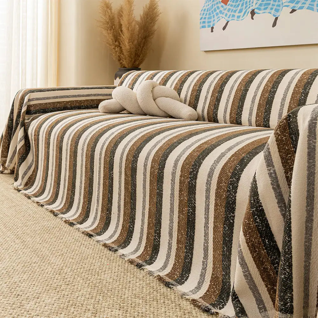 Unisex chenille all-season sofa protector couch cover in a neutral tone, showcasing its stretch fit and pet-friendly fabric.