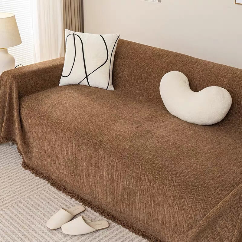 Detail shot of corner on chenille herringbone sofa slipcover, snug fit furniture cover, home decor accent