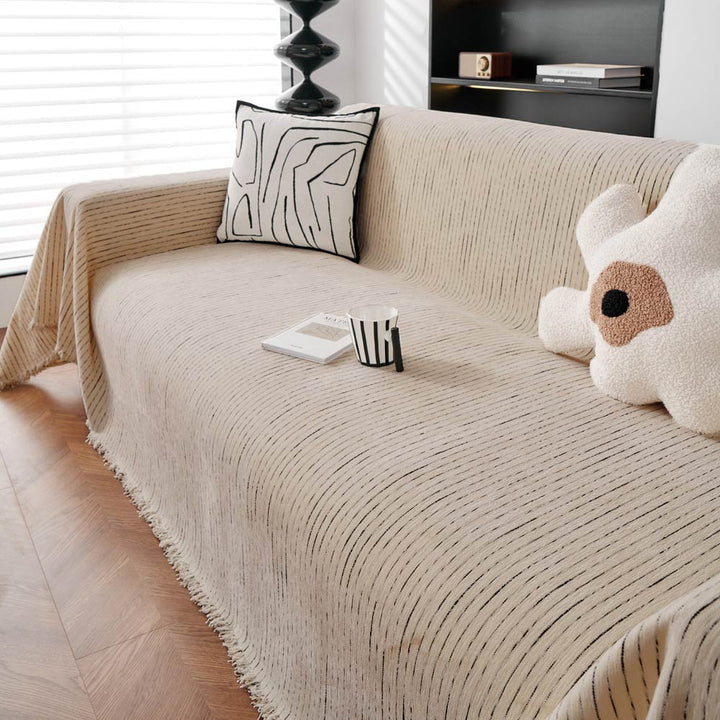 Unisex chenille sofa cover with a subtle pattern, enhancing modern living room aesthetics and comfort