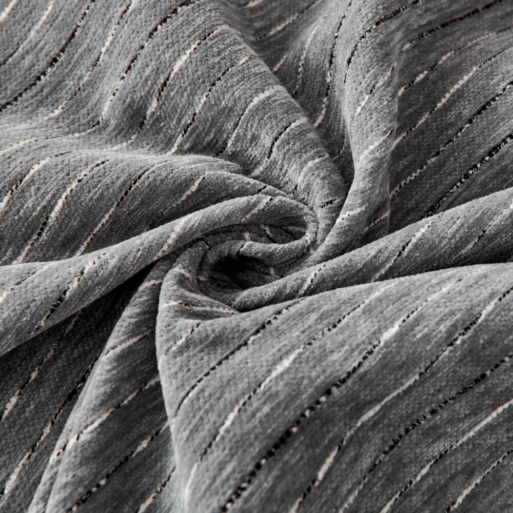 Detail of the border of a unisex chenille sofa cover, highlighting its quality and home decor appeal