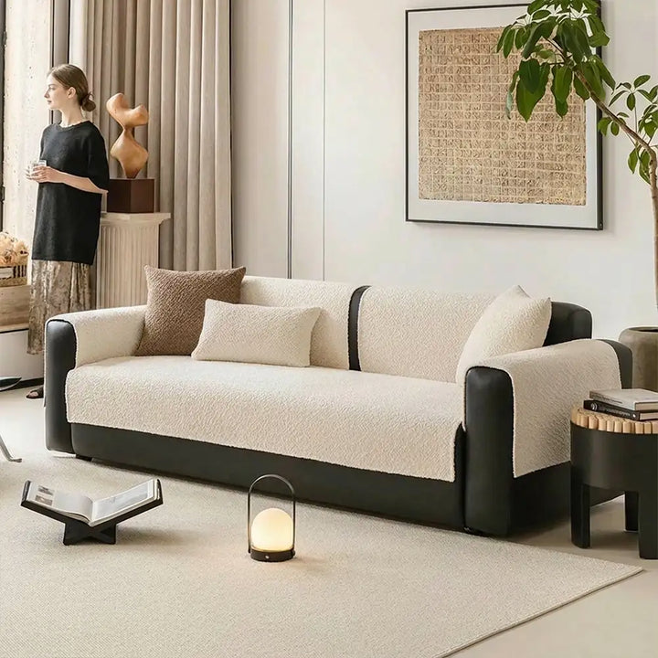 Packaging of the machine washable chenille sofa cover, emphasizing its pet-proof and all-season benefits