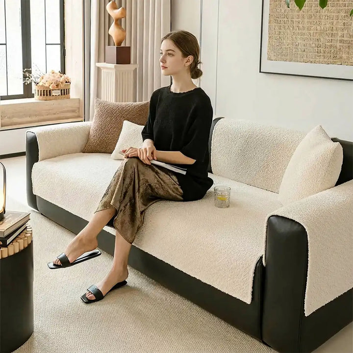 View of a living room with a chenille sofa protector, showcasing enhanced decor and scratch protection