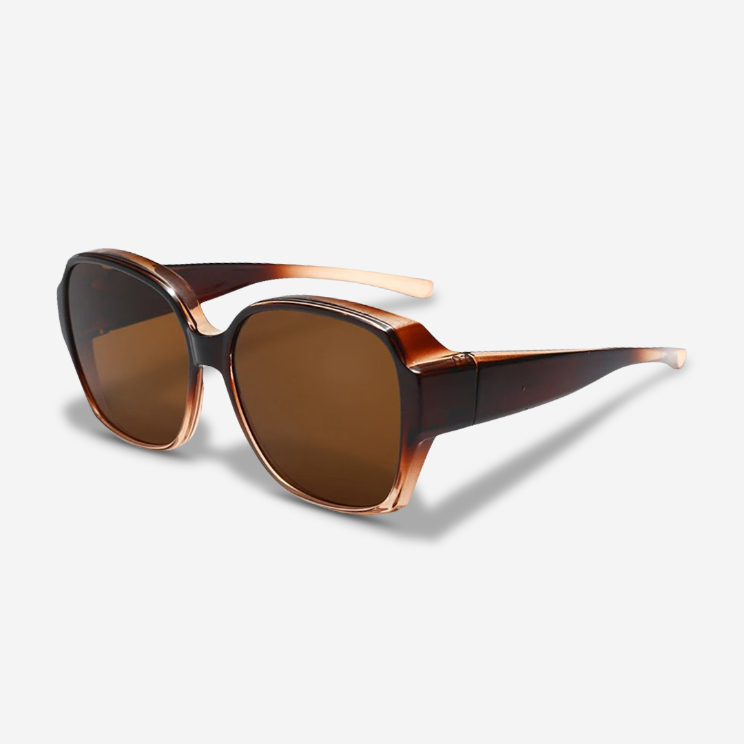 Lightweight unisex clip-on sunglasses easily attach to prescription glasses for instant UV400 sun protection.