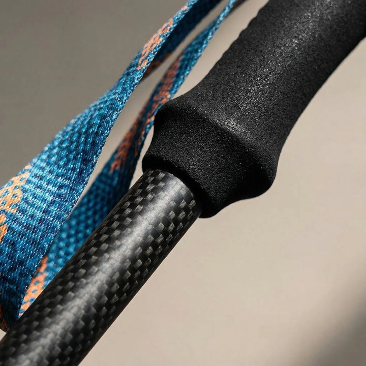 Foldable carbon fiber hiking poles, perfect for travel, walking, and outdoor adventures.