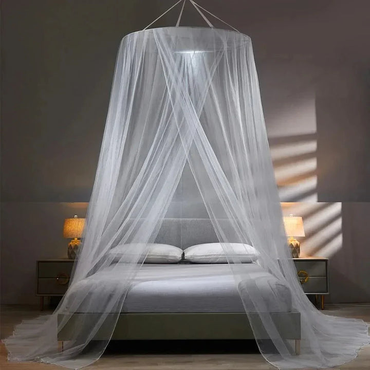 Easy setup of a portable, collapsible mosquito net, offering quick insect protection for comfortable, bug-free sleep.