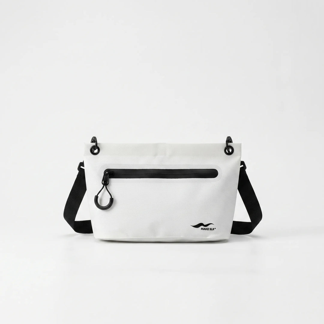 Waterproof shoulder dry bag for securing outdoor essentials; perfect for adventure gear.