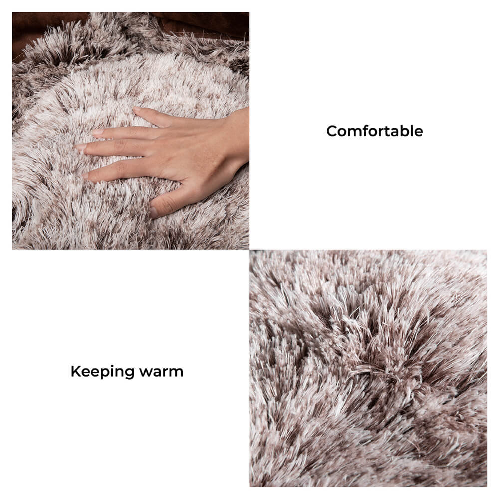 Luxurious round pet bed with faux fur, enhancing home decor, for small dogs and cats.