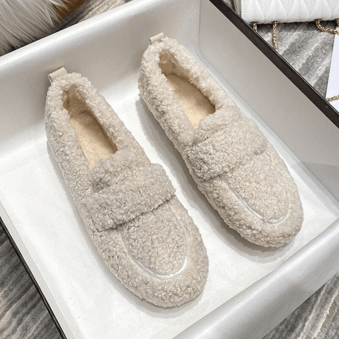 Men's & women's cozy winter house shoes. Non-slip sole ensures ultimate warmth & comfortable indoor relaxation.
