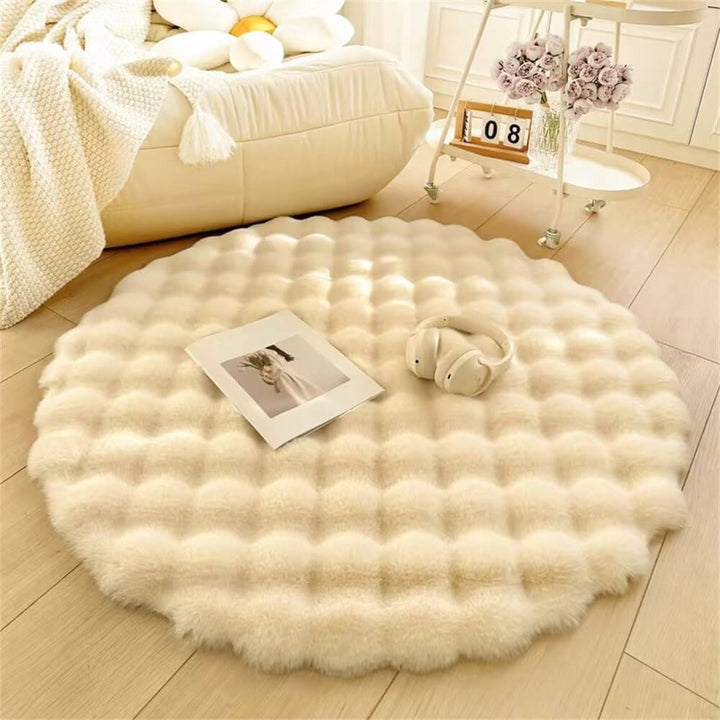 Soft polyester fluffy round area rug in creamy white, ideal for comfortable home decor