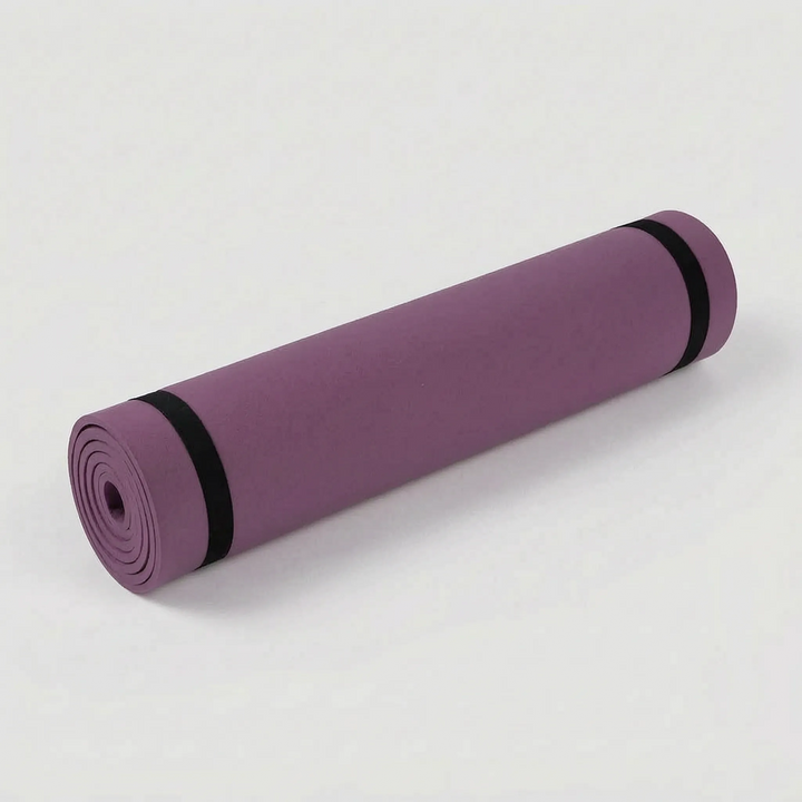 Rolled up portable cushioned exercise mat, easy to carry & store. Ideal non-slip fitness mat for home or gym.