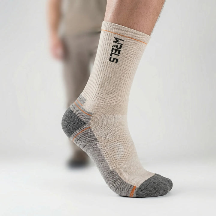 High-performance unisex mid-calf athletic socks. Cushioned, breathable & moisture-wicking for all sports.