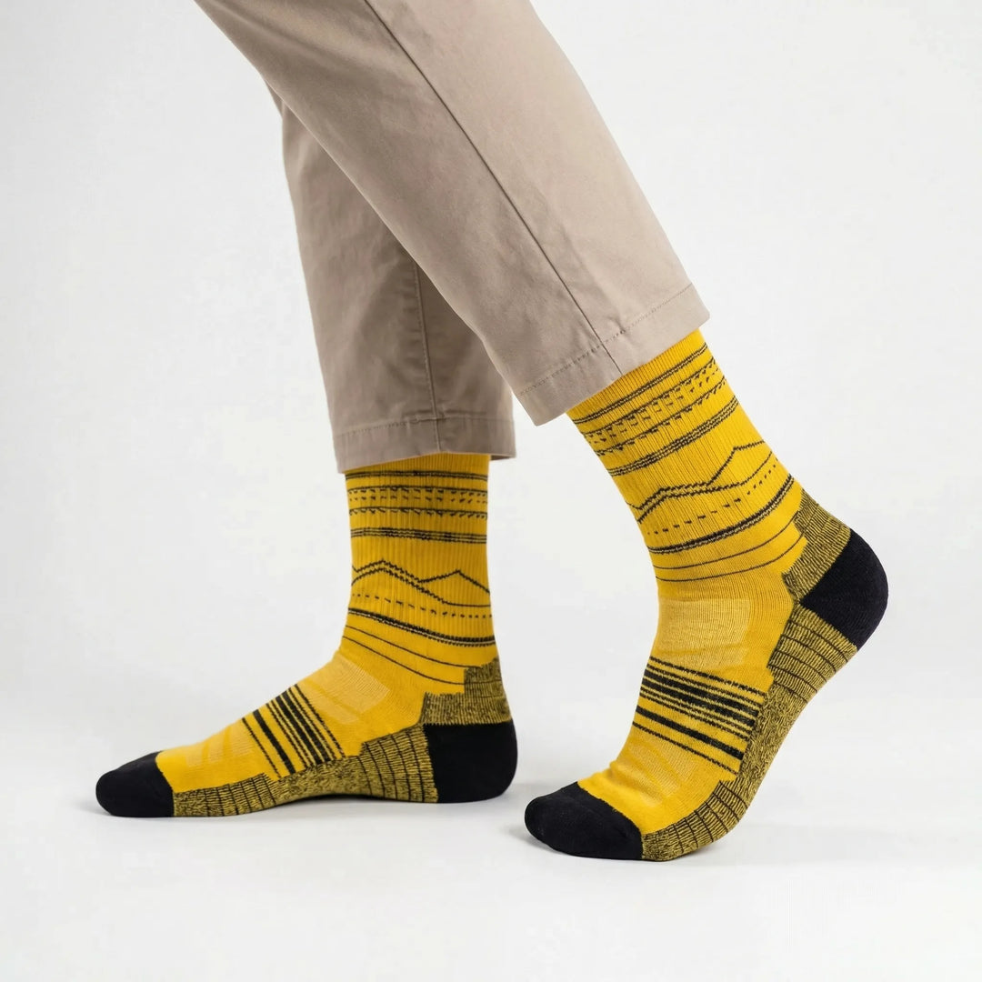 Durable unisex cushioned mid-calf performance socks. Arch support, merino wool, moisture-wicking for active comfort.