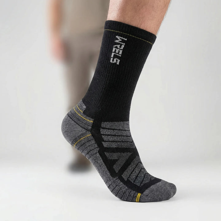 Close-up of unisex cushioned mid-calf active socks, highlighting plush merino wool & breathable fabric.
