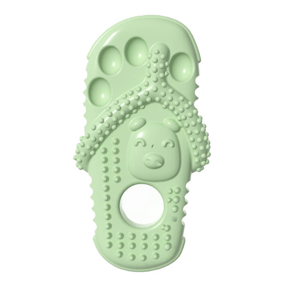 Side view of a TPR dog chew toy, highlighting its teeth cleaning nubs and slipper design
