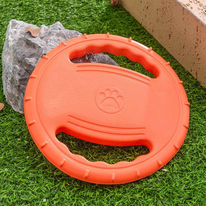 Tough rubber dog flying disc, white, for durable interactive play and pet exercise.