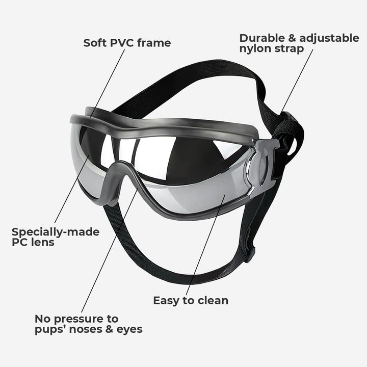 Close-up of shatterproof dog goggles with adjustable strap, offering anti-fog pet eyewear